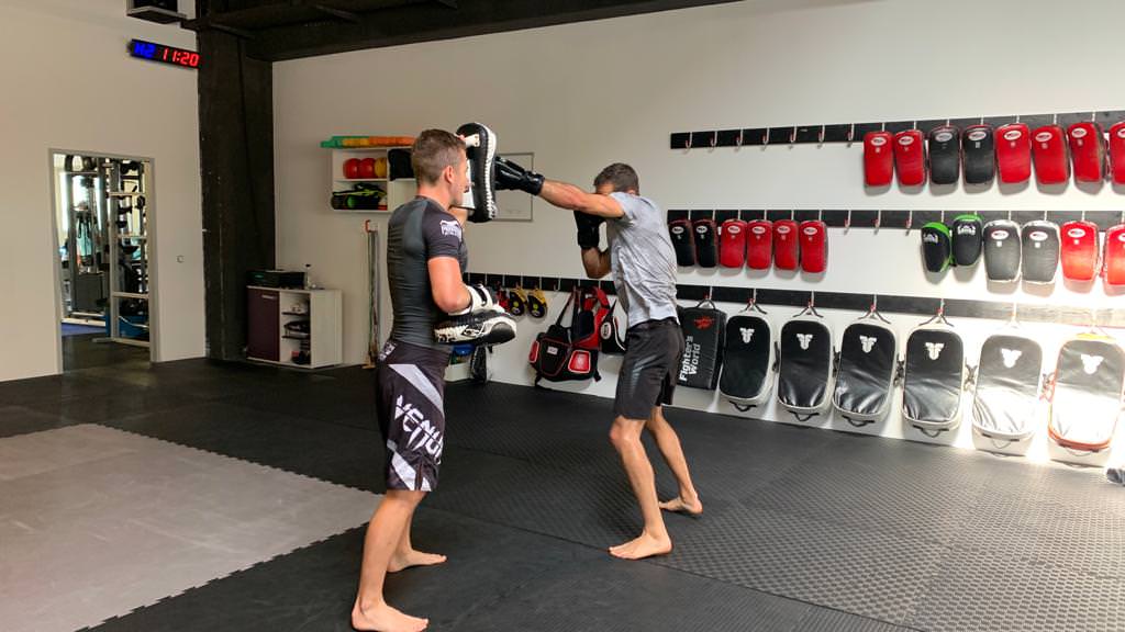 Straight punches on thai pads